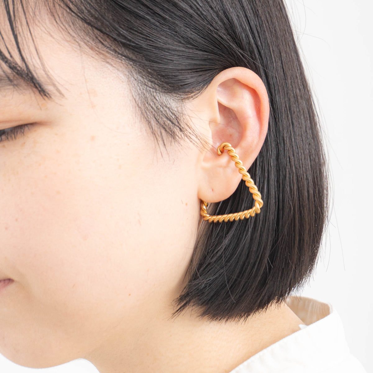 _Fot｜twist form cuff triangle col.gold